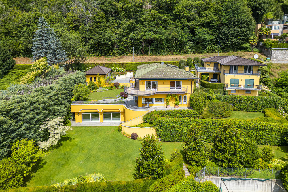 Casa di 17 locali in vendita a Porza - immagine 1/13
