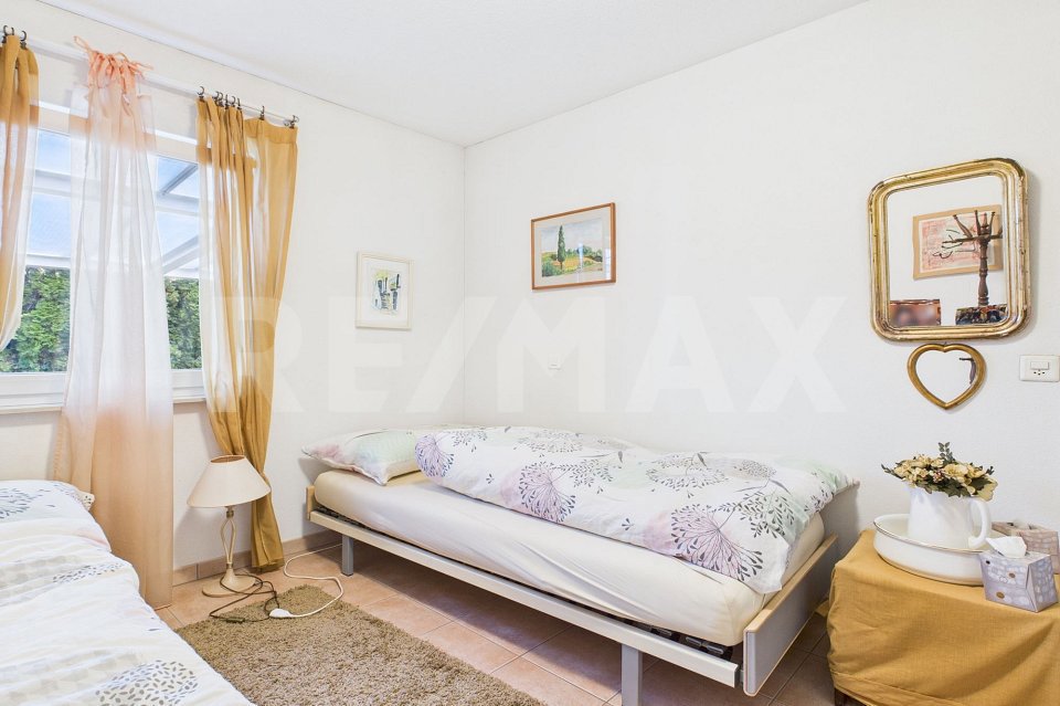Casa di 5 locali in vendita a Ponte Tresa - immagine 1/13