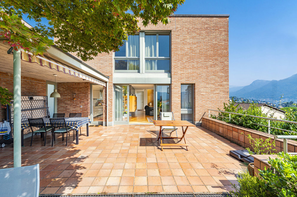 Casa di 10 locali in vendita a Breganzona - immagine 1/13