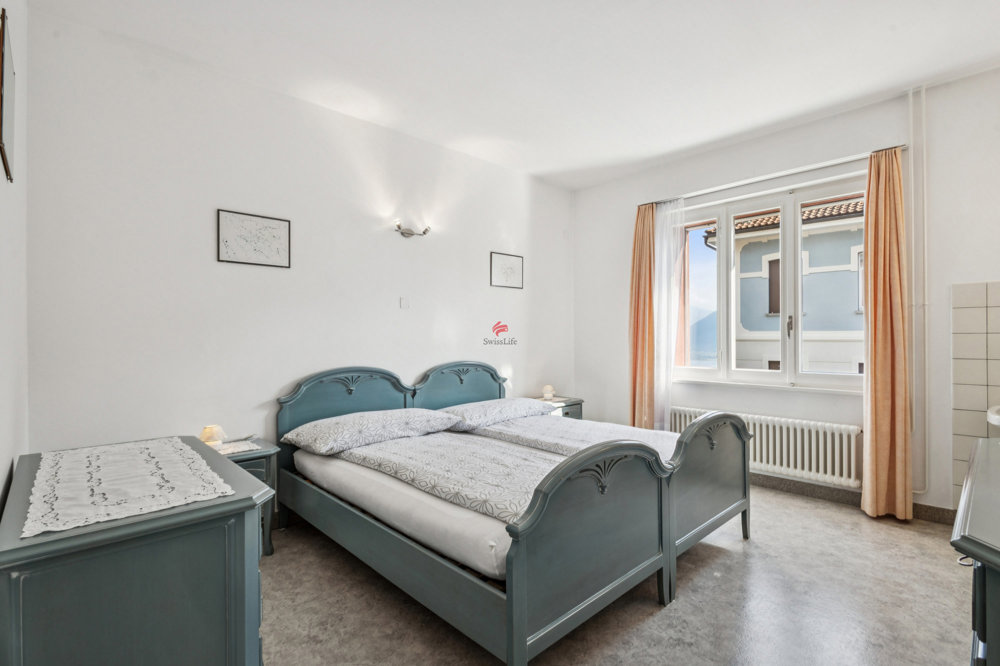 Casa di 6 locali in vendita a Orselina - immagine 1/12