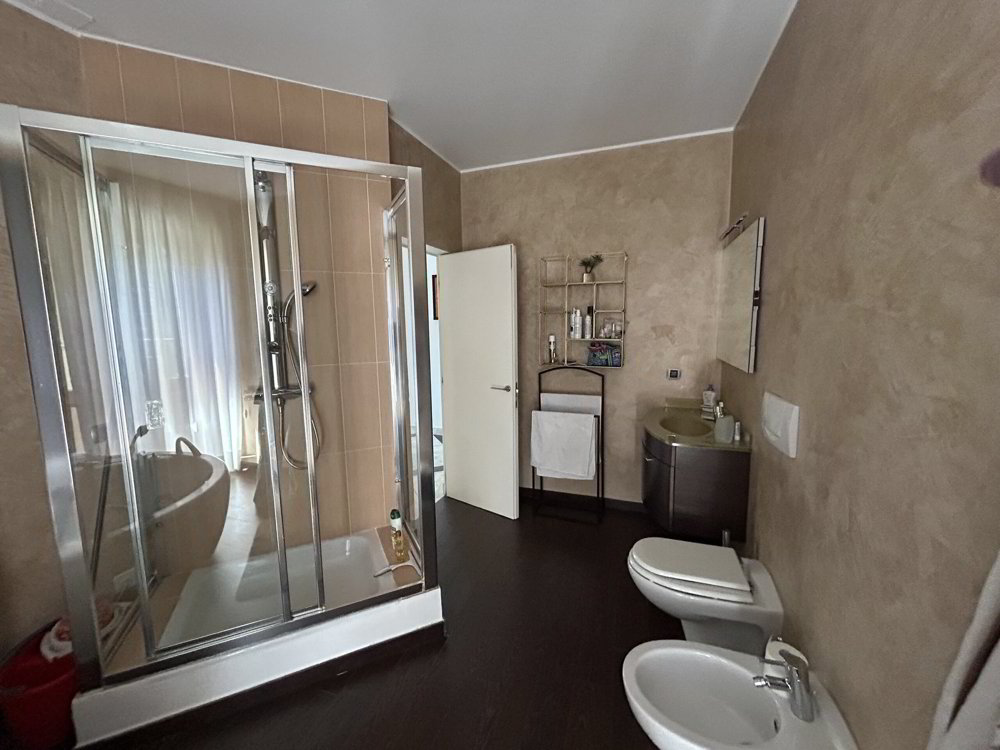 Appartamento di 3.5 locali in vendita a Ruvigliana - immagine 1/14