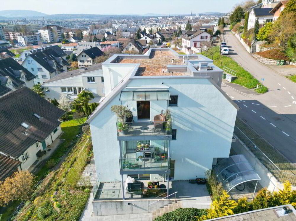 3 rooms Apartment to buy in Bachenbülach - image 1/13
