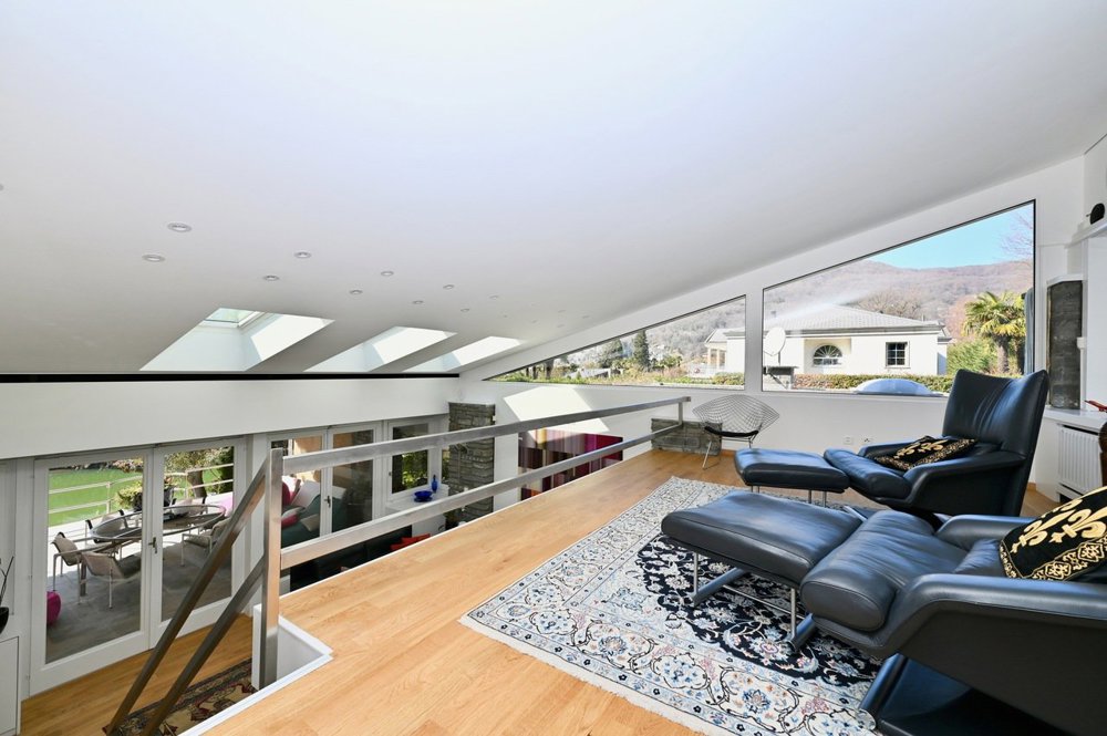 Casa di 9 locali in vendita a Caslano - immagine 1/13