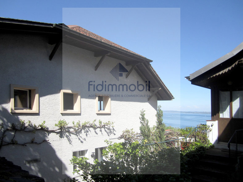 Maison 6 pièces à louer à Vaumarcus - image 1/13
