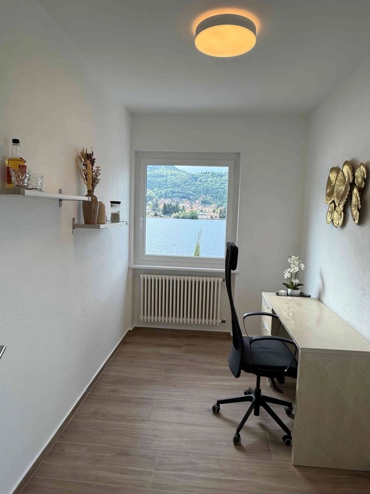 Casa di 5.5 locali in affitto a Morcote - immagine 1/13