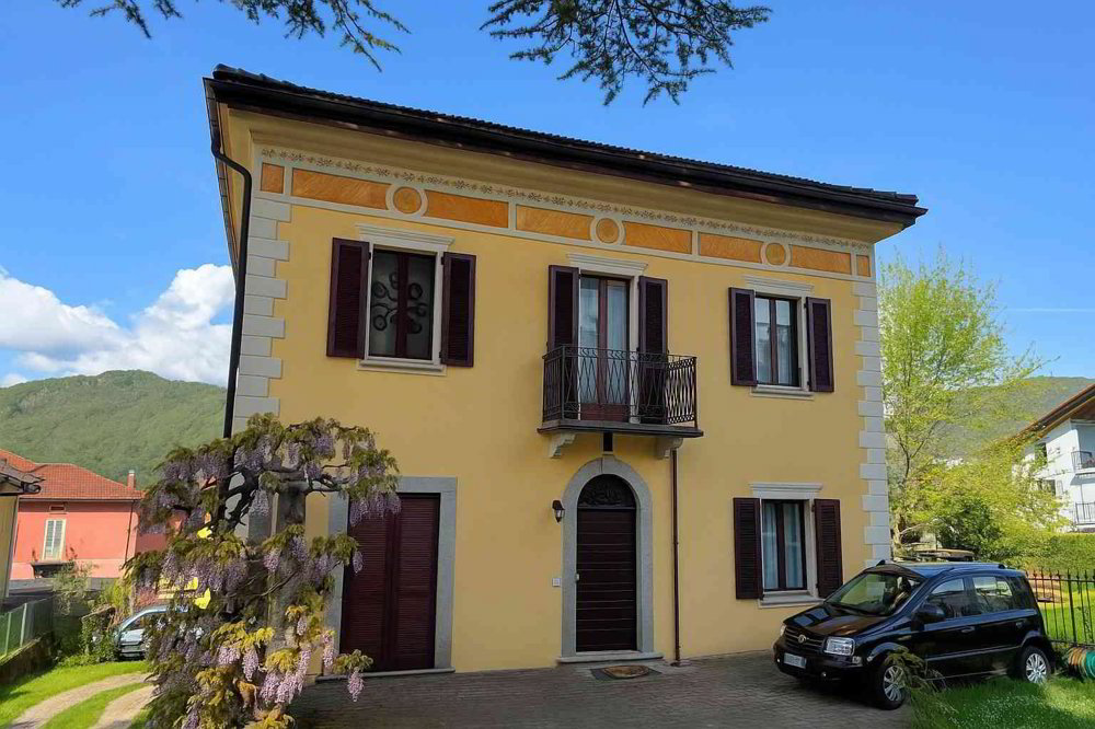 Casa di 7 locali in vendita a Cadro - immagine 1/12