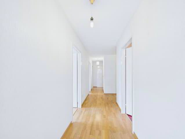 Helle und grosszügige 4.5-Zimmer-Wohnung mit Balkon im Herzen von Visp - Ansicht 2