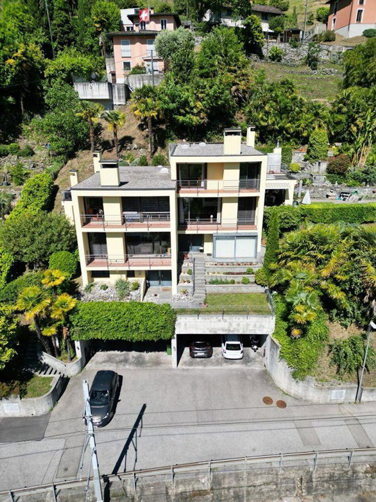 Casa di 8 locali in vendita a Solduno - immagine 1/13
