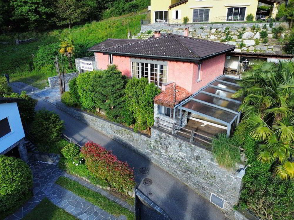 Casa di 4 locali in vendita a Tegna - immagine 1/21