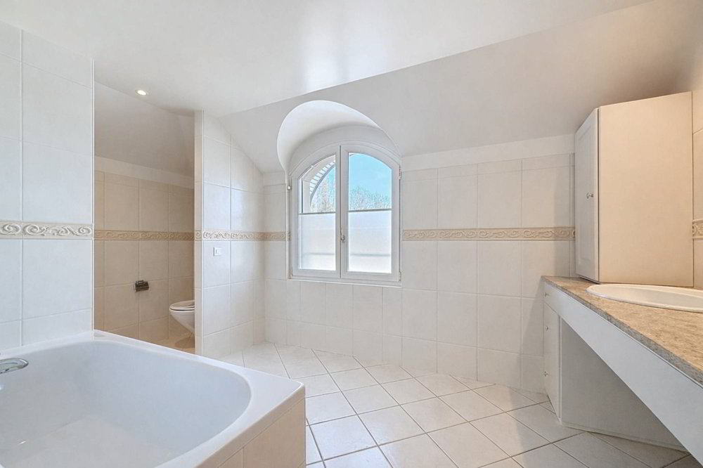 Casa di 12 locali in vendita a Lutry - immagine 1/13