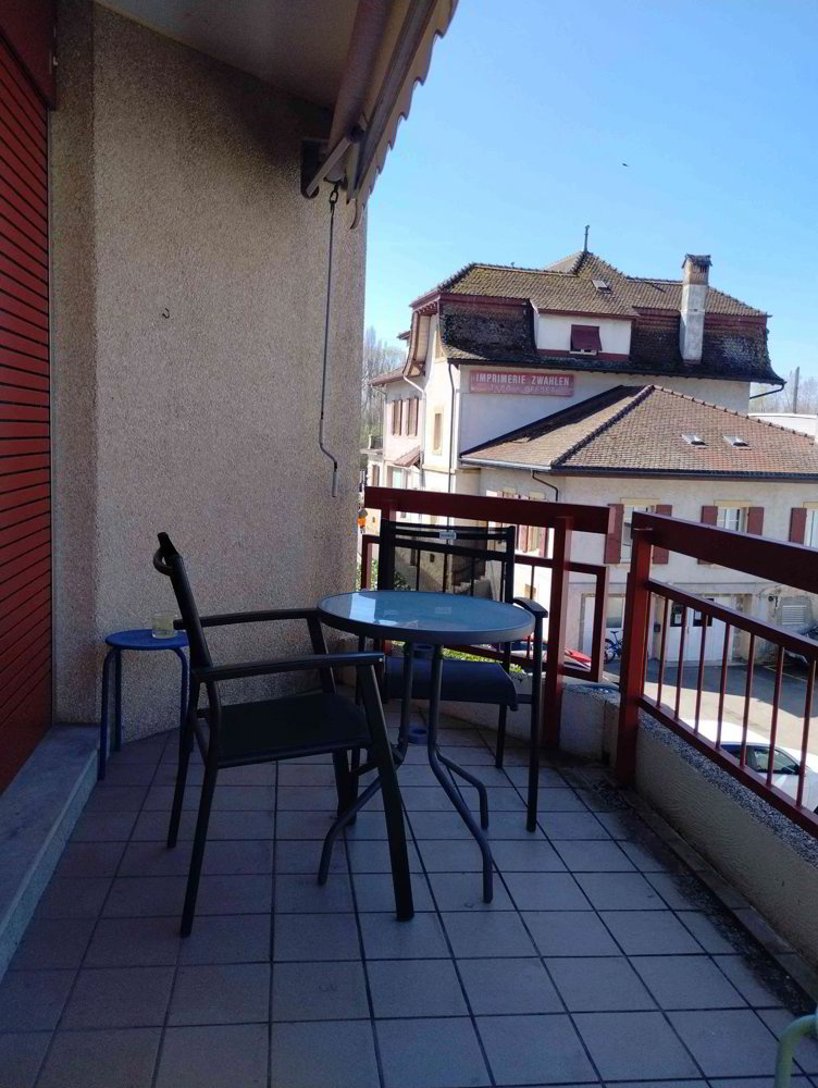 Appartement 2.5 pièces à louer à St-Blaise - image 1/5