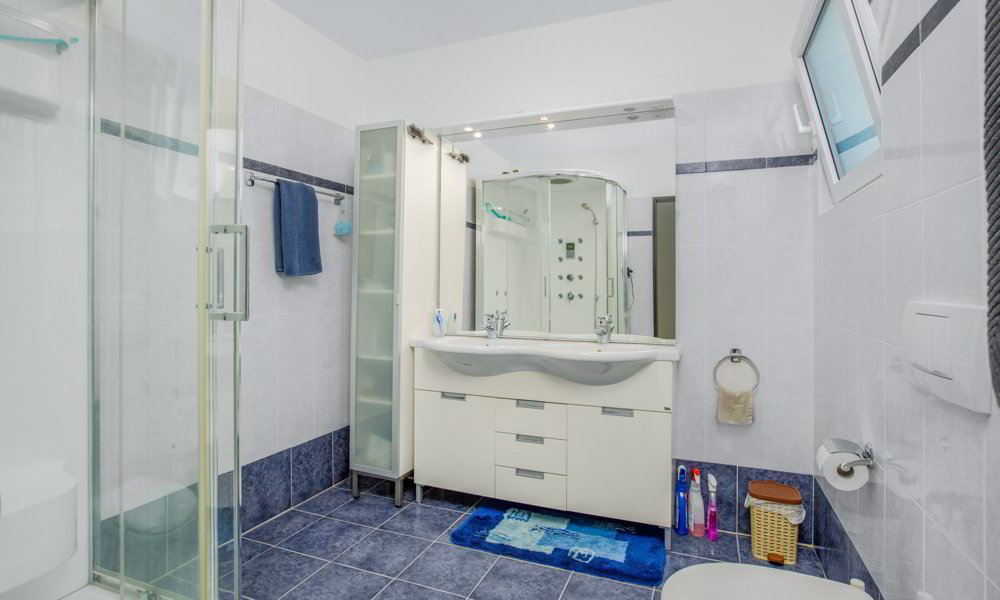 5.5 Zimmer Haus zum verkaufen in Mezzovico - Bild 1/11