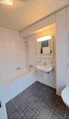 6 Zimmer Wohnung zu vermieten in Fleurier - Bild 1/13