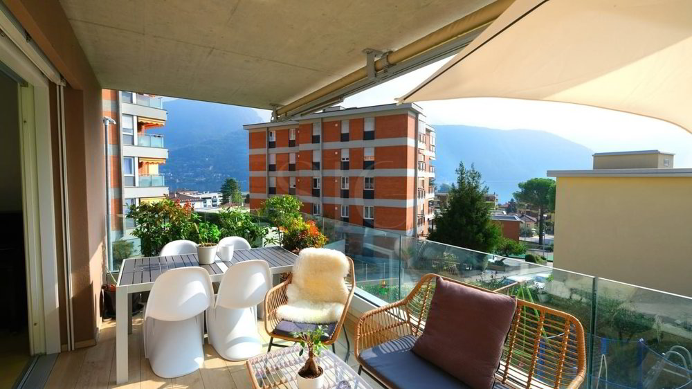 Appartement 4 pièces à acheter à Melide - image 1/10