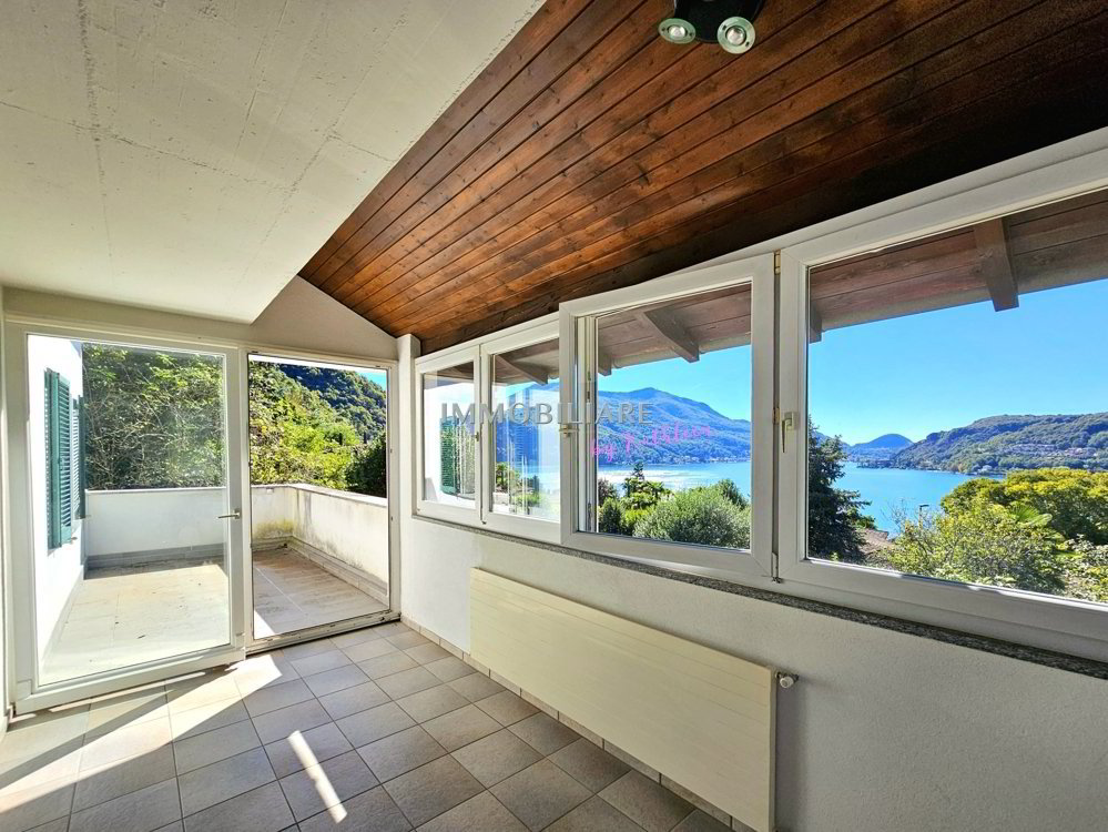 Casa di 23 locali in vendita a Morcote - immagine 1/13