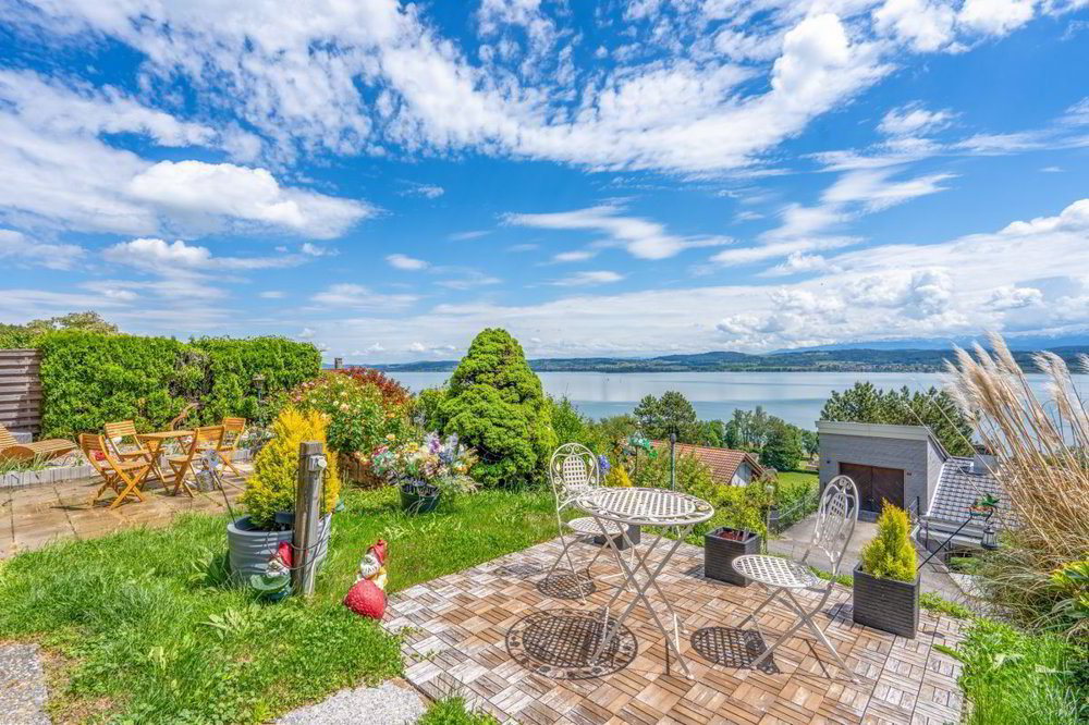 Wunderschönes Grundstück mit Seeblick auf den Murtensee und der Möglichkeit zum Bau einer Wohnung oder eines Hauses - Ansicht 2
