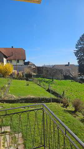 Einfamilienhaus mit 2 Wohnungen und wunderbarer Weitsicht in die Berge - Ansicht 2