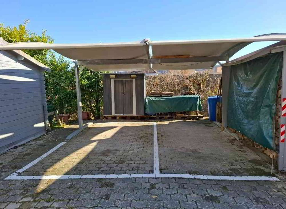 A LOUER 2 PLACES DE PARC COUVERTES - 2525 Le Landeron / NE