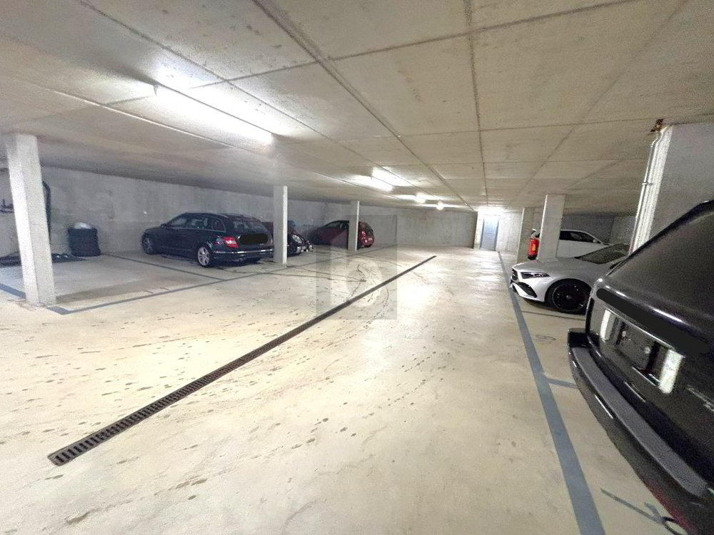 PARKING NEUF EN SOUS-SOL AU CUR DU VILLAGE ! - Ansicht 2