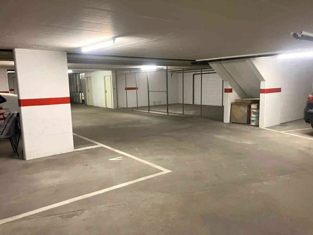 Places de parc dans garage souterrain chauffé, à 5 min. de Delémont - Ansicht 2