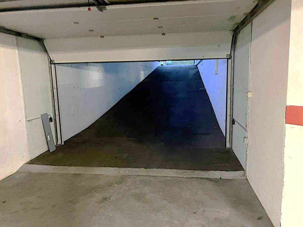 Places de parc dans garage souterrain chauffé, à 5 min. de Delémont - Ansicht 5