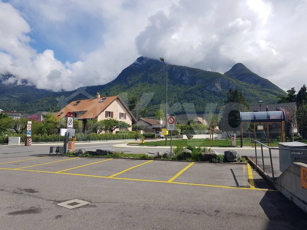 null rooms Car park, garage for rent in Aigle - image 1/2