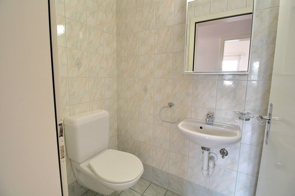 4 rooms Apartment to buy in Givisiez - image 1/13