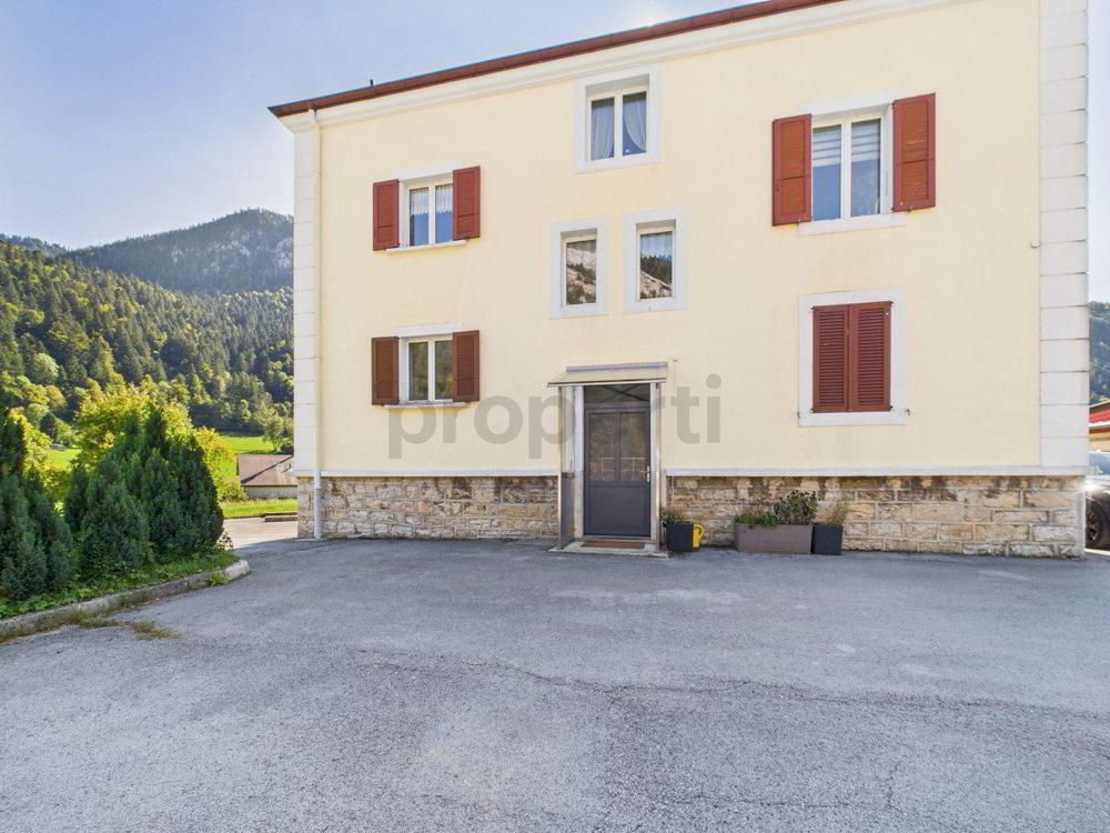 Immeuble de rendement avec 2 appartements, atelier et grand terrain à Noiraigue - Ansicht 5