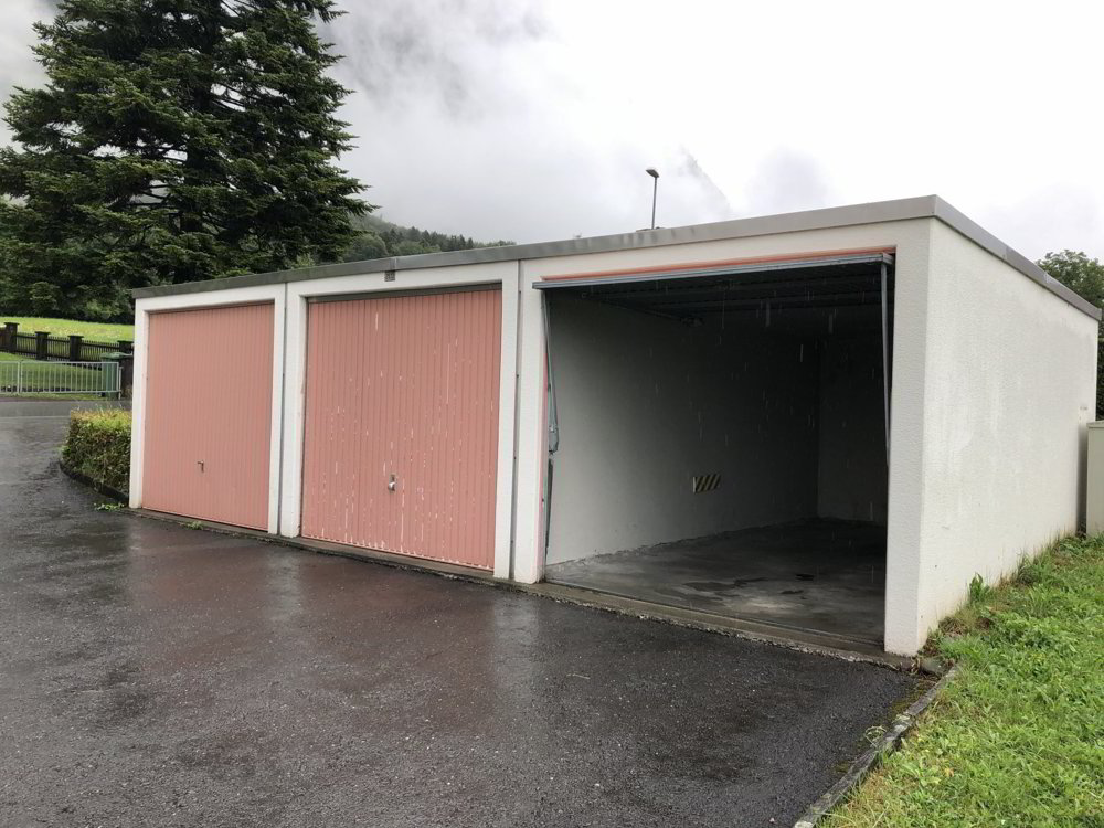 null rooms Car park, garage for rent in Sennwald - image 1/2