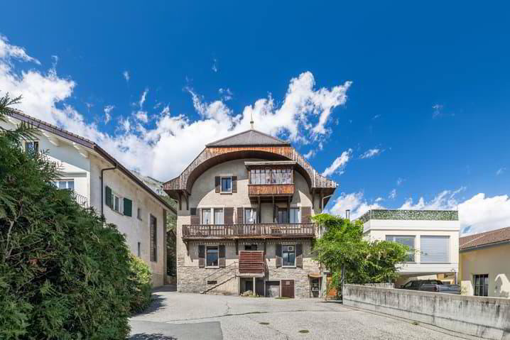 Immeuble de rendement au coeur du village.