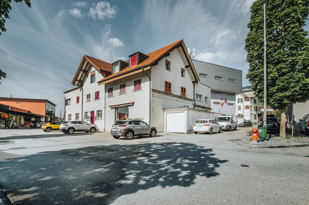 Vielseitige Gewerbeliegenschaft mit drei Wohnungen und guter Verkehrsanbindung - Ansicht 4