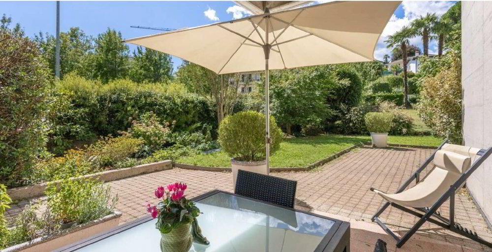 4 rooms Apartment to buy in Porza - image 1/1