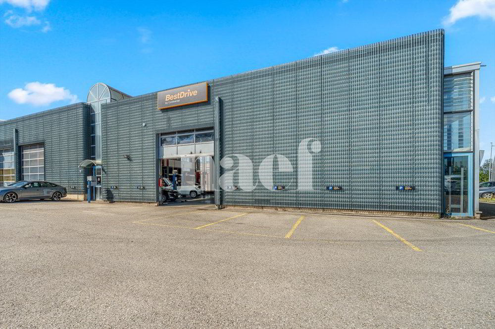 Garage avec réception, atelier et espaces de stockage à vendre à Givisiez