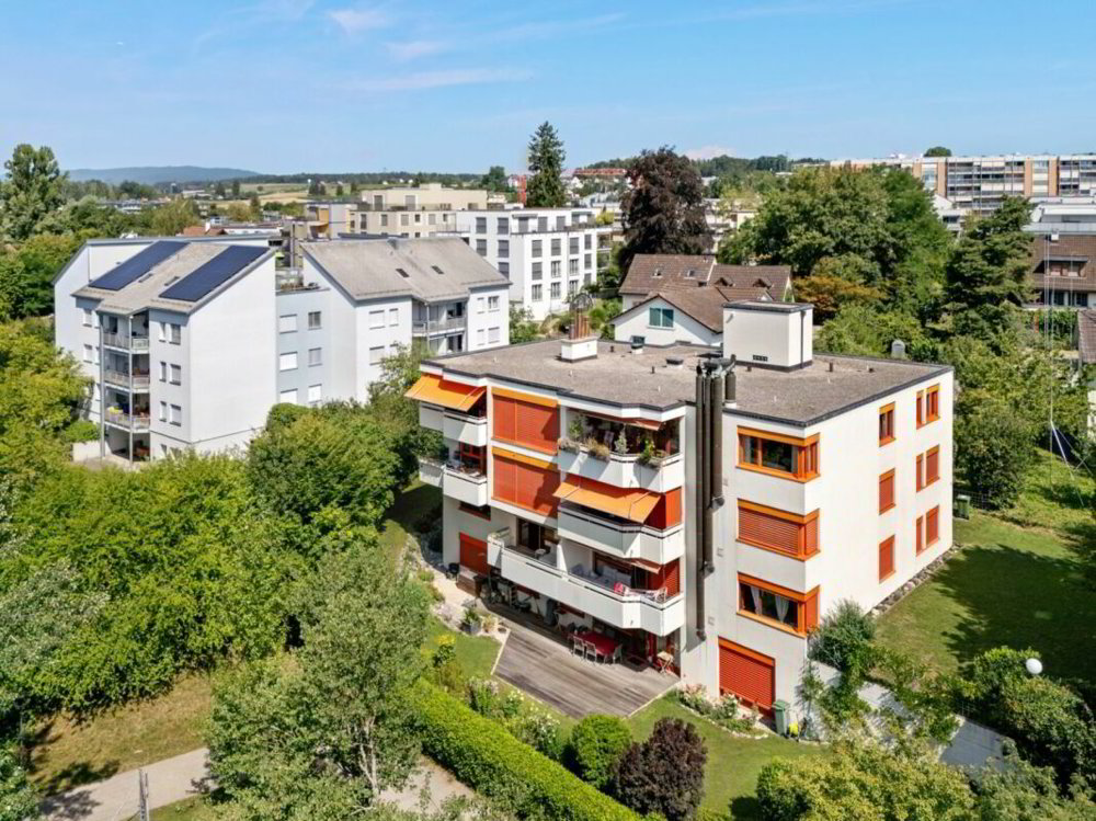 3.5-Zimmer-Topgeschosswohnung mit Cheminée und Parkplatz