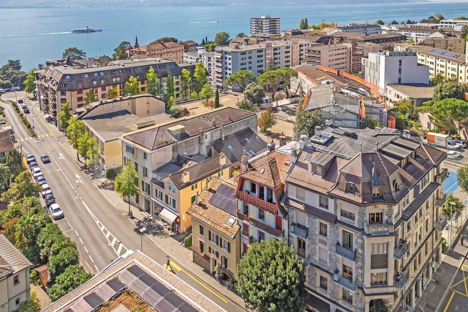 Immeuble de rendement : 2 surfaces commerciales et 4 appartements 3.5 pièces - Ansicht 4