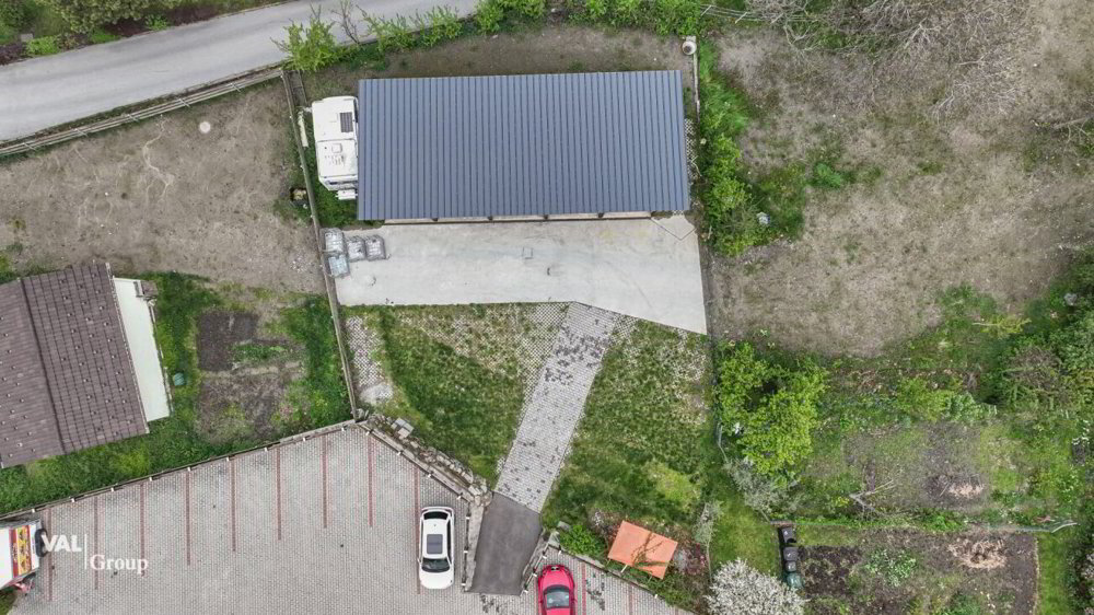 Acht Aussenparkplätze und fünf moderne Garagen in zentraler Lage - Ansicht 3