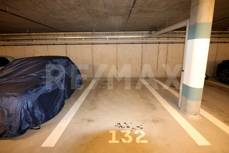Grosszügiger Tiefgaragenparkplatz in der Überbauung Schlossbungert in Zizers - Ansicht 3