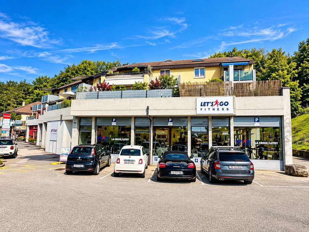 Pour investisseurs – Lot de 4 appartements, une surface commerciale en PPE et 10 parkings - Mehr