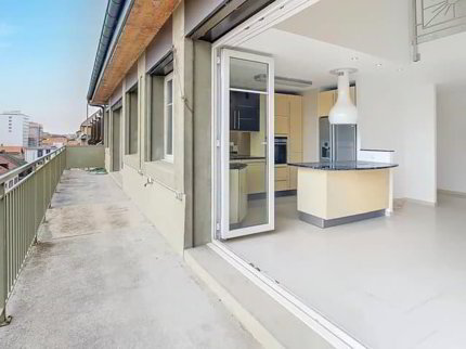 Duplex en attique avec terrasse au centre-ville 1/5