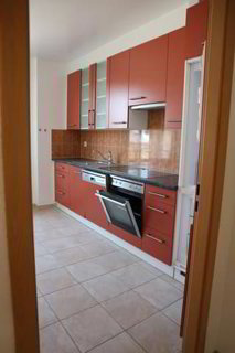 4 pièces dans petit immeuble locatif 1/5