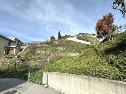 TERRENO CON LICENZA PER UNA VILLA DI PREGIO A COMANO 1/5