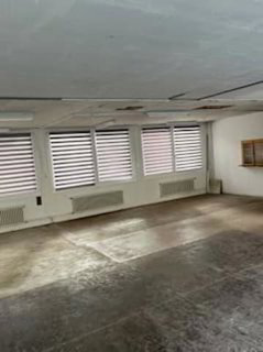 Espace commercial et atelier au rez-de-chaussée au Locle 1/3