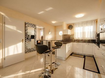 Maison jumelée par les garages de 6.5 pièces en vente à Quartier Les Îles - 170 m² 1/5