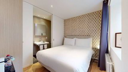 Chambre idéalement située dans immeuble au bord du lac 1/3
