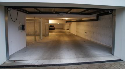 Private Tiefgaragenplätze mit flacher Ausfahrt 1/5