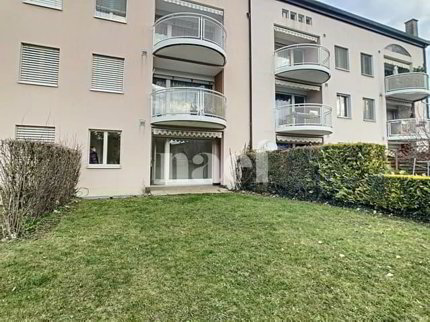Appartement de 2.5 pièces au rez avec jardin 1/5