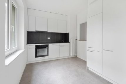 Appartement de 3.5 pièces rénové dans un quartier calme et ensoleillé 1/5