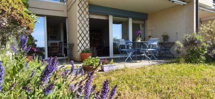 Appartement de 2.5 p. avec terrasse et jardin 1/5