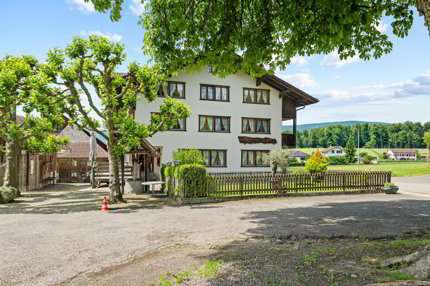 Mehrfamilienhaus mit zusätzlichem Bauland 1/5