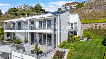 Maison jumelle de 7.5 pièces avec une vue panoramique sur le lac à... 1/5